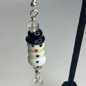 Glass snowmen earrings with bright green scarf